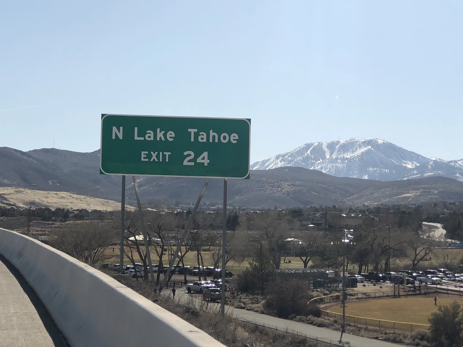 Road sign on Interstate 580 (US 395) for Exit 24 to N Lake Tahoe