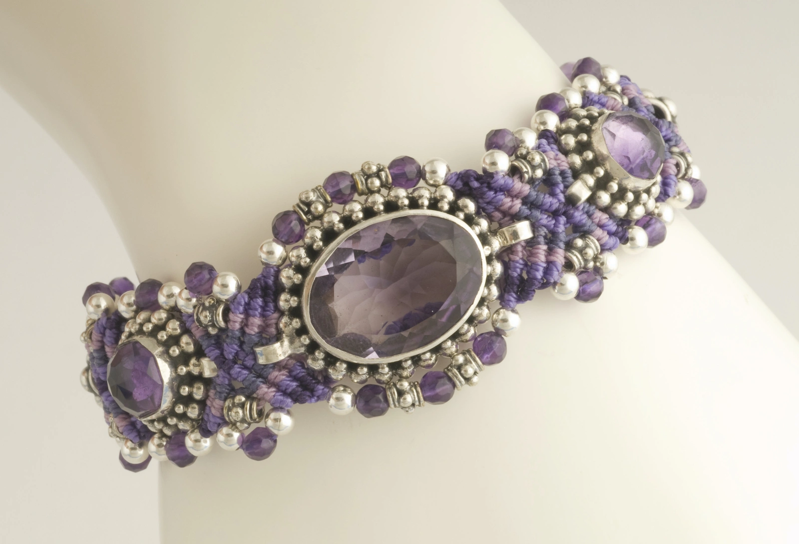 Amethyst and purple macramé nomadic knotwork style bracelet by designer Isha Elafi