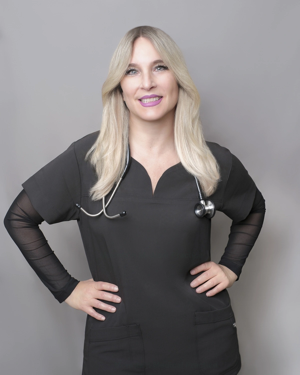 Dr. Maria Pirraglia in black scrubs with stethoscope around neck